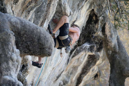 Mountaineers exercise rock climbing at Beach Bay in Krabi, Thailand 03 12 2019のeditorial素材