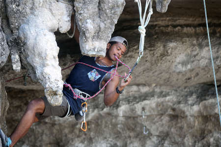 Mountaineers exercise rock climbing at Beach Bay in Krabi, Thailand 03 12 2019のeditorial素材