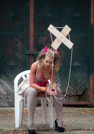 A girl with an original Halloween costume made by herself is ready to celebrate. Conceptual social photographyの写真素材