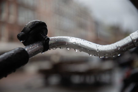 Close up details of a wet bike after rain, raindrop aesthetics. Amsterdamの写真素材