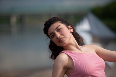 Portrait of a young emotional woman with expressive hands