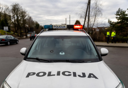 Police car, signal beacons, police sign. Lithuaniaの写真素材