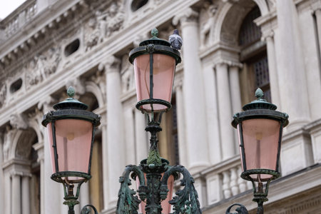 Old wall street lighting, in the old town, Venice, Italyの写真素材