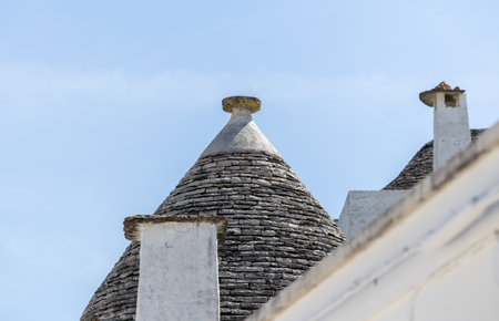 Typical trulli houses with conical roof in Alberobello, Apulia, southern Italyの写真素材