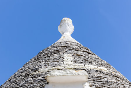 Typical trulli houses with conical roof in Alberobello, Apulia, southern Italyの写真素材