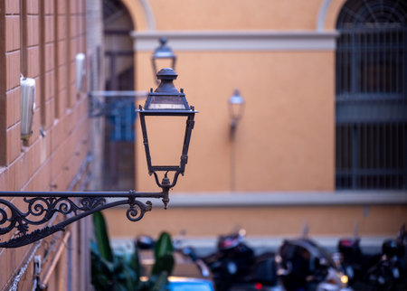 Old wall street lighting in the old town of Bologna. Italyの写真素材