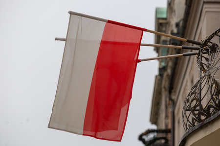 Polish Flag Adorning a City Streetの写真素材