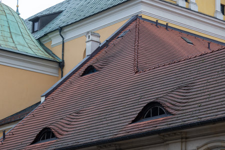 Terracotta Tiled Roofs with Dormer Windows in PoznaÅ, Polandの写真素材