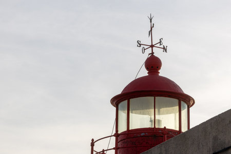 The famous red lighthouse of Nazar, the place further to the west of Europe (Portugal)の写真素材