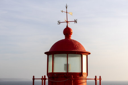The famous red lighthouse of Nazar, the place further to the west of Europe (Portugal)の写真素材