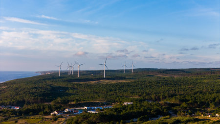 Silhouettes of wind turbines, wind power plants in Portugal, Europe. Ecological, saving energyの写真素材