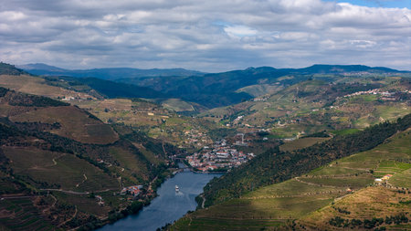 View of the terraced vineyards in the Douro Valley and river near the village of Pinhao, Portugal. Concept for travel in Portugal and most beautiful places in Portugalの写真素材