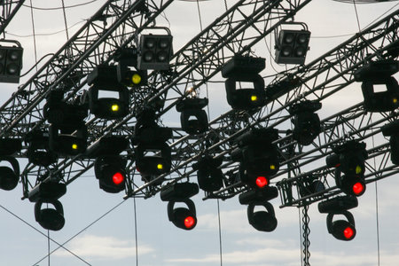 Professional stage lighting equipment ready for operation, behind the scenesの写真素材