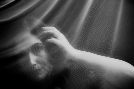 Portrait of a Beautiful Woman Through a Translucent Veil â The Shroud of Mysteryの写真素材