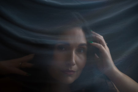 Portrait of a Beautiful Woman Through a Translucent Veil â The Shroud of Mysteryの写真素材