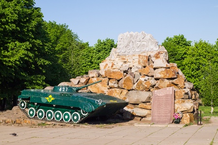 Monument to the residents of the town of Krasny Luch, who died in Afghanistan. Established September 7, 1997 in the Park 3rd district Krasny Luch. Luhansk region, Ukraine.のeditorial素材
