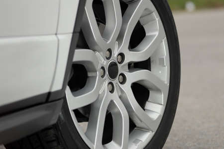 aluminium Wheel on a white sport car, fragmentの写真素材