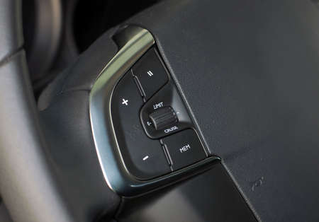 Cruise control button on the steering wheel