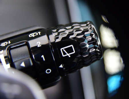 Switch to activate wiper in passenger car