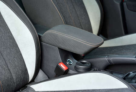 Armrest in the luxury passenger car between the front seatsの写真素材