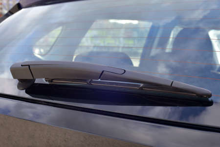 Wiper on the back windshield of a passenger car