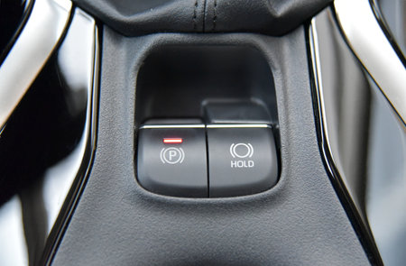 Button to activate the electric parking brake on the car