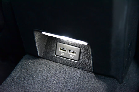 Two USB ports for the rear seats in a passenger car