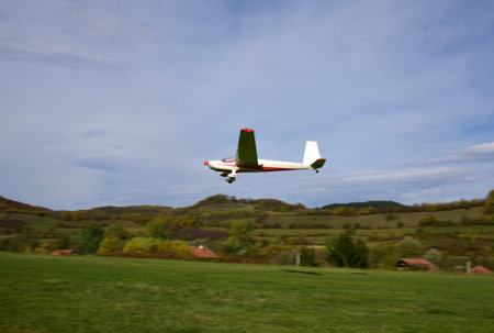 A light single-engine sport plane taking off