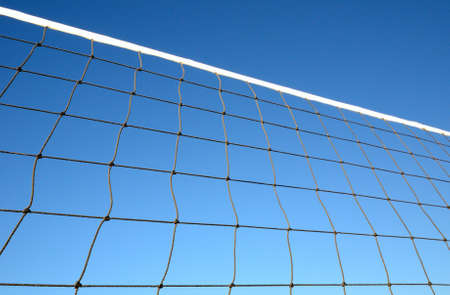 Part of volleyball net against clear blue skyの写真素材