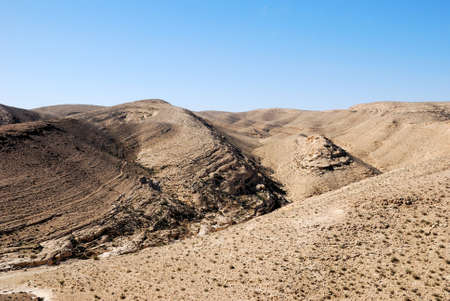 Ancient mountains under blue sky. Desert Negev, Israel.の写真素材