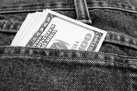 Lot of dollars in a pocket of jeans. B&Wの写真素材