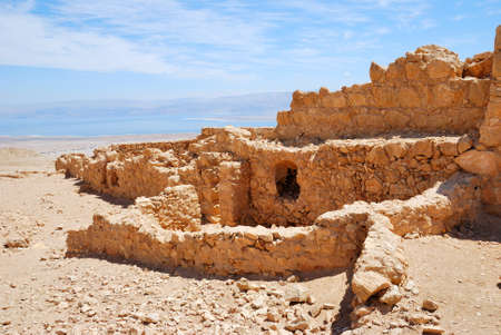 Masada - ancient  fortress in the South of Israel, on the eastern edge of the Judean Desert overlooking the Dead Sea. After the First Jewish-Roman War (also known as the Great Jewish Revolt) a siege of the fortress by troops of the Roman Empire led to theの写真素材