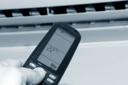 Remote control directed on the air conditionerの写真素材