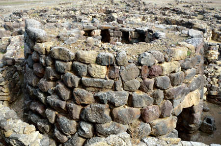 The nuraghe (nuraghi, nuraghes) is ancient megalithic edifice, the symbol of Sardinia and the Nuragic civilization.の写真素材