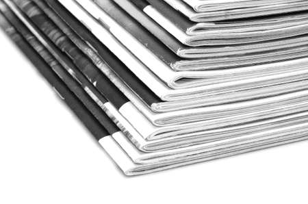 Stack of old colored magazines on white background. B&Wの写真素材