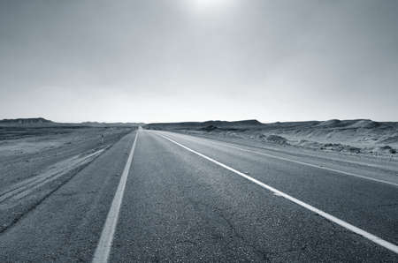 Fragment of road in the desert. Monochromeの写真素材