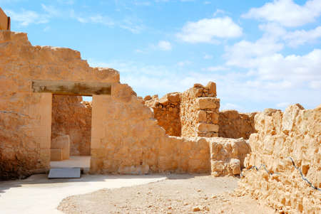 Masada - ancient  fortress in the South of Israel, on the eastern edge of the Judean Desert overlooking the Dead Sea. After the First Jewish-Roman War (also known as the Great Jewish Revolt) a siege of the fortress by troops of the Roman Empire led to theの写真素材