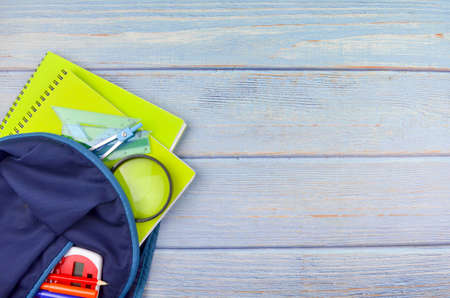 Student backpack and various school supplies, studing, education and back to school concept.の写真素材