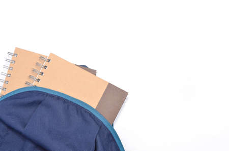 View of flat lay with school backpack and stationery with space for text on white background. Selective focus.の写真素材