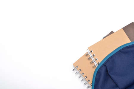 View of flat lay with school backpack and stationery with space for text on white background....