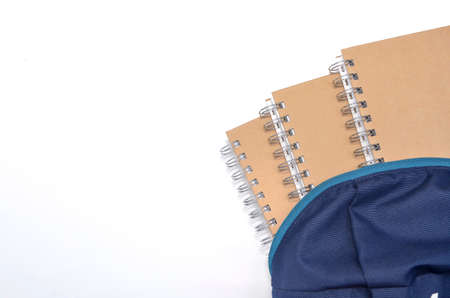 View of flat lay with school backpack and stationery with space for text on white background. Selective focus.の写真素材