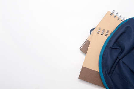 View of flat lay with school backpack and stationery with space for text on white background. Selective focus.の写真素材