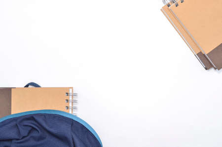 View of flat lay with school backpack and stationery with space for text on white background. Selective focus.の写真素材