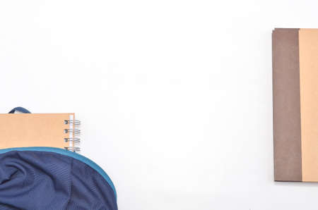 View of flat lay with school backpack and stationery with space for text on white background. Selective focus.の写真素材