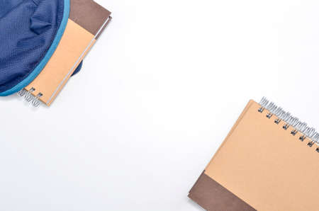 View of flat lay with school backpack and stationery with space for text on white background. Selective focus.の写真素材