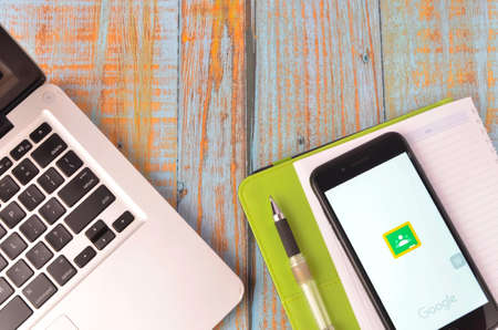 Kuala Lumpur, Malaysia - April 16, 2020 -Black smart phone with Google Classroom application on screen. Online education concept.のeditorial素材