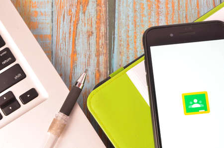 Kuala Lumpur, Malaysia - April 16, 2020 -Black smart phone with Google Classroom application on screen. Online education concept.のeditorial素材