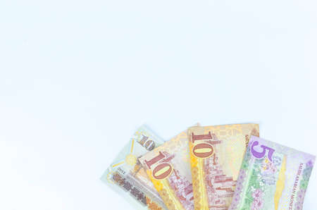 Saudi Arabia money on white background.