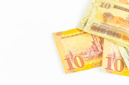 Saudi Arabia money on white background.