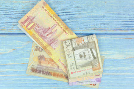 Saudi Arabia money on wooden background.の写真素材